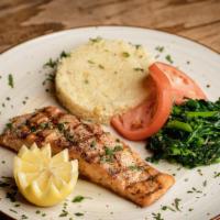 Grilled Salmon & Couscous · Grilled salmon fillet served with broccoli rabe, and Mediterranean couscous