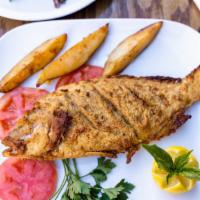  Red Snapper   ( Whole) · SERVED WHOLE.
Wild Caught. Delicate white meat, lightly fried . Served with mashed potato & ...