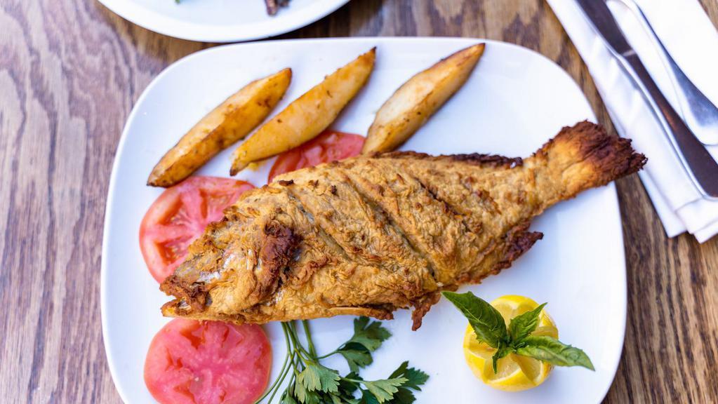  Red Snapper   ( Whole) · SERVED WHOLE.
Wild Caught. Delicate white meat, lightly fried . Served with mashed potato & broccoli rabe