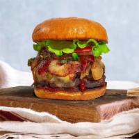 Feels Like Home Burger · Chopped sirloin patty with sautéed mushroom, onions and melted Swiss cheese, lettuce, tomato...