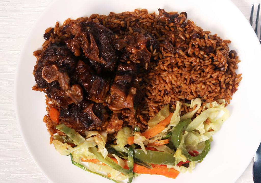 Curry Goat · Served with peas your choice of rice and choice of two vegetables. Choice of medium or large.