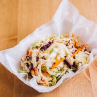Coleslaw (Each) · Cabbage, purple cabbage, carrots and apple with dressing.