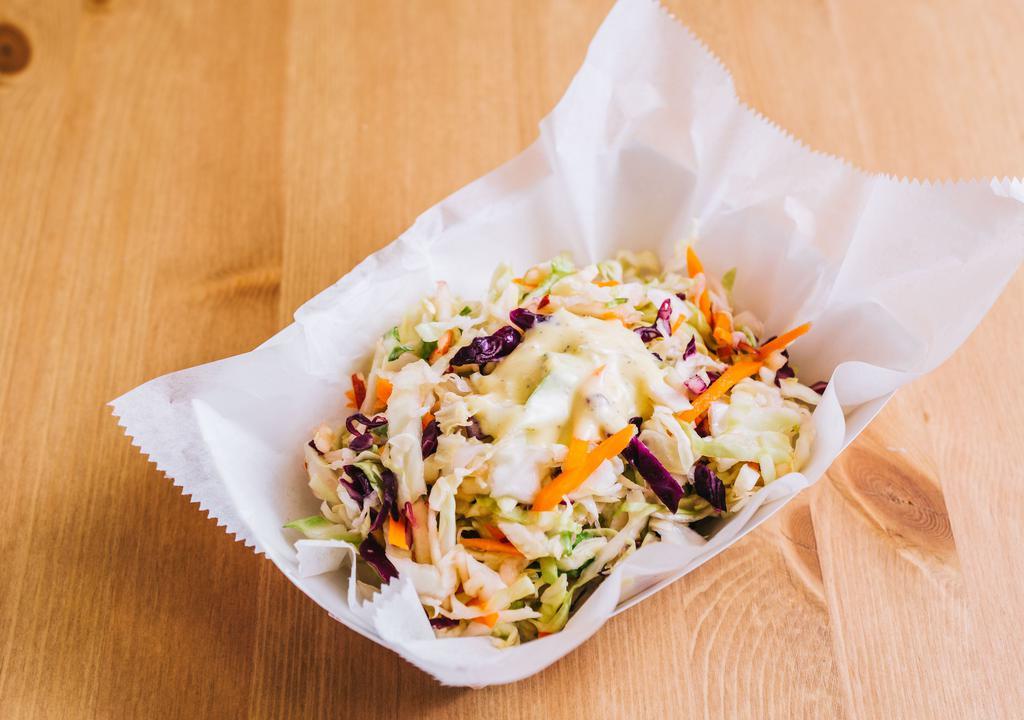 Coleslaw (Each) · Cabbage, purple cabbage, carrots and apple with dressing.