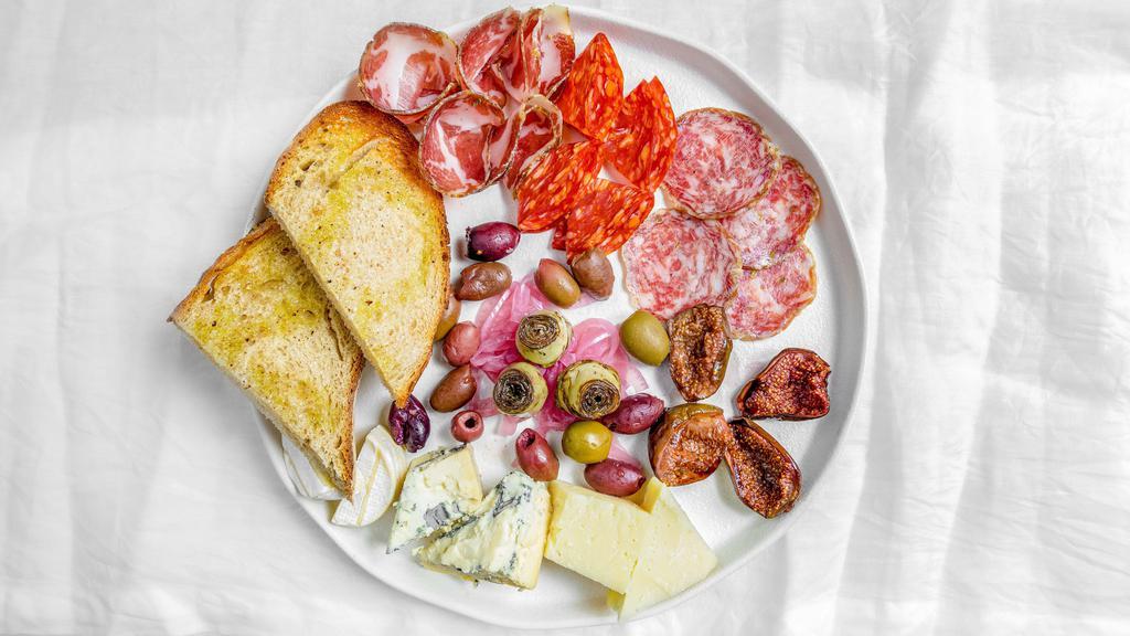 Wine Plate · Capocollo, salame toscano, salame piccante, alpha Tolman, blue Hazen, Willoughby, figs, olives, pickle onions, sourdough toast.