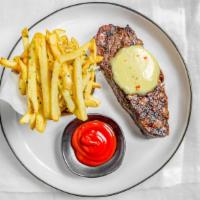 Steak Frites · Prime NY strip, beurre Maître D, truffle fries.