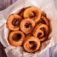 Onion Rings · Battered, crispy, golden fried onion rings.