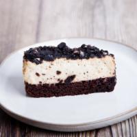 Oreo Cheesecake · Creamy, rich NY-style cheesecake marbled with crumbled Oreo pieces.