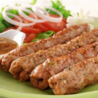 Seekh Kabab · Ground chicken with our house blend of onions, herbs and aromatic spices, skewered and grill...