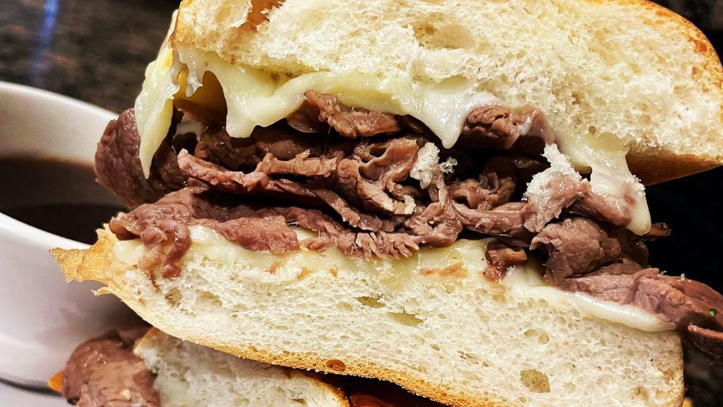 French Dip · Hot, succulent roast beef topped with mozzarella cheese and served with au jus.