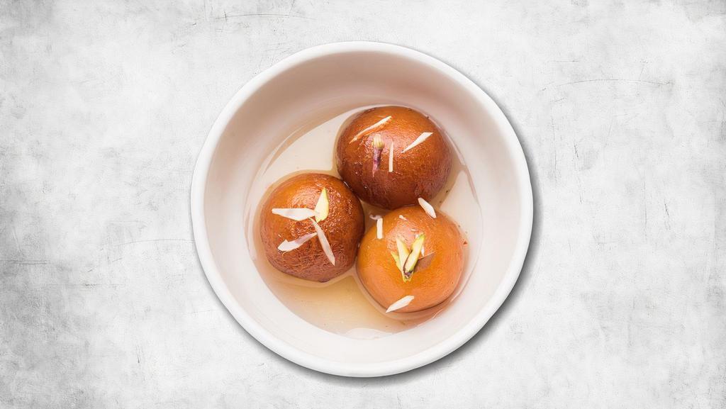 Gulab Jamun · Two pieces. Soft delicious berry sized balls made of milk solids, flour & a leavening agent.