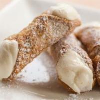 Homemade Italian Cannolis · A crispy pastry freshly filled with Italian ricotta and bittersweet chocolate chips, dusted ...