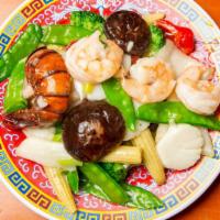 Seafood Deluxe · Assorted seafood contained lobster meats, scallops and jumbo shrimps with mixed vegetables s...