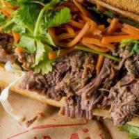 Bonmi Red Eye Bánh Mì Sandwich · Asian BBQ 18 Hour Beef, Cucumbers, Pickled Onion & Carrot, Spicy Mayo & Cilantro on a Crisp ...