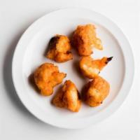 Eso Side Crispy Buffalo Cauliflower Bites · Cauliflower battered with Aleppo pepper and buffalo-style hot sauce. Served with ranch for d...