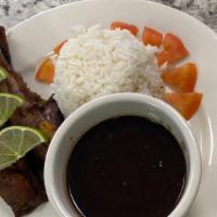 Costillas / Ribs · Con Arroz y habichuelas/ With Rice and Beans