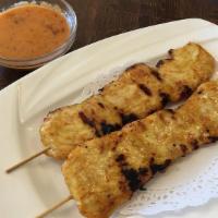 Satay  · Grilled chicken, beef, or shrimp (two pieces).