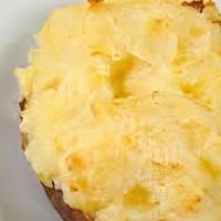 Cheesy &  Buttery · Baked Potato
+ Salt & Pepper
+ Cheese & Butter
+ Any Sauce(s)