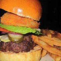 Prime Beef Burger · 8 oz. burger with romaine lettuce, tomato, red onion, and pickle. Served with french fries.