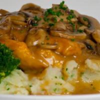 Chicken Marsala · Tender chicken cutlet with a mushroom and marsala wine sauce. Served with mashed potatoes an...