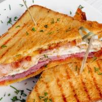 Ham, Egg & Cheese Sandwich · Fresh, fluffy scrambled eggs, layers of thinly sliced ham with melty cheese on a toasted, bu...
