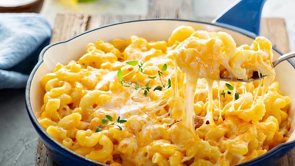 Mac N' Cheese With Grilled Chicken · Delicious Mac N' Cheese dish mixed with grilled chicken.