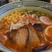Spicy Miso Ramen · Pork belly, 1/2 soft boiled egg, scallion, fish cake, corn, bean sprouts, pork broth and thi...