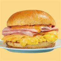  Bs06A. Ham & Egg Breakfast Sandwich · 2 eggs and your choice of ham served on your choice of bread. Cheese, veggies & additional m...