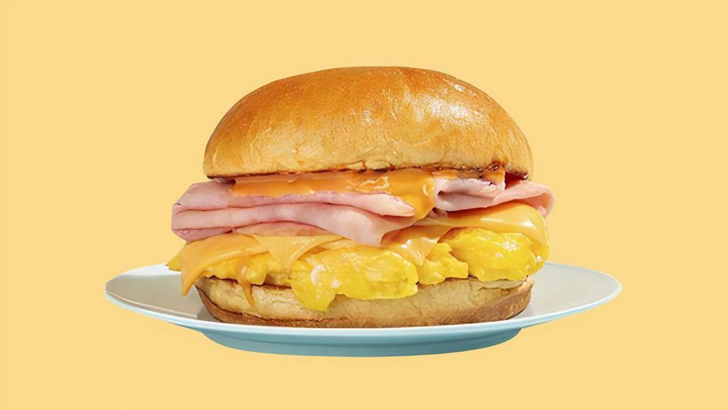  Bs06A. Ham & Egg Breakfast Sandwich · 2 eggs and your choice of ham served on your choice of bread. Cheese, veggies & additional meats optional.