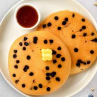 Chocolate Pancakes · Fluffy chocolate chip pancakes cooked with care and love served with butter and maple syrup....