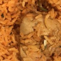 Chicken Biryani · Long grain basmati rice cooked with chicken and our special inhouse biryani masala.
