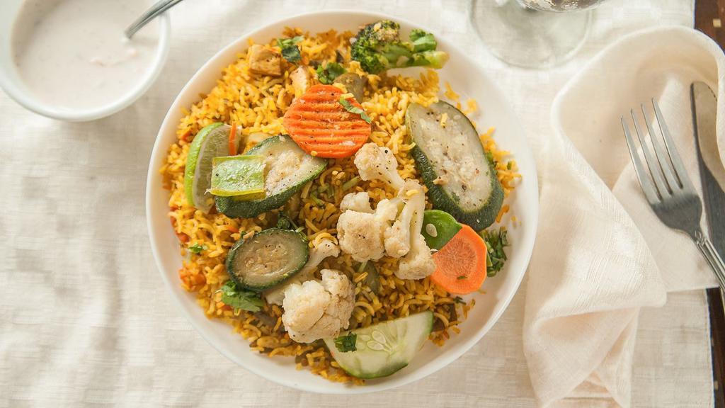 Vegetable Biryani · naturally aromatic long grain rice cooked with vegetables.