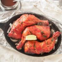 Tandoori Chicken Full · Spring chicken marinated in yogurt, freshly ground mild spices and lemon juice, cooked in ta...