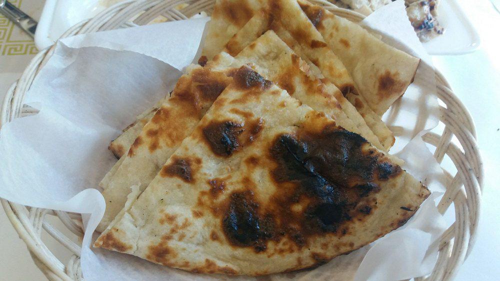 Naan · Leavened bread of super fine flour baked in tandoor, served piping hot.