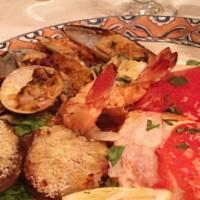 Hot Antipasto · Baked clams, eggplant rollatini, and shrimp oreganata.