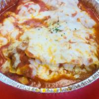Meat Lasagna · Our homemade lasagna features layers of slow braised beef, creamy ricotta, al dente pasta sh...