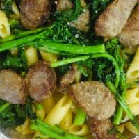 Pasta Veneziani · Sliced sausage and broccoli rabe in olive oil garlic.