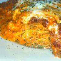 Chicken Alla Vodka Dinner (Top Seller) · Golden fried chicken cutlets in a creamy pink vodka sauce topped with melted mozzarella. Ser...