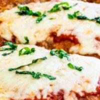 Chicken Parmigiana Dinner · Breaded chicken, sauce, and melted Mozzarella cheese.