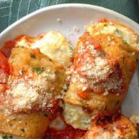 Eggplant Rollatine (3) · Pieces of fried eggplant, rolled with seasoned ricotta and Romano cheese, topped with sauce ...
