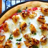 Chicken Parmesan Pizza · Crispy chicken, tomato sauce, and Mozzarella cheese.