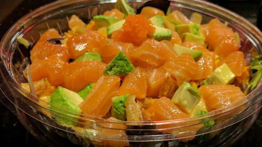 Salmon Salad · Salmon salad, cucumber, avocado, masago, with spring, and mix chef’s special sauce.