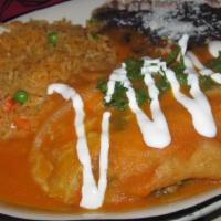 Chiles Rellenos
 · Roasted poblano pepper stuffed with cheese coated in an egg batter. Served with special toma...