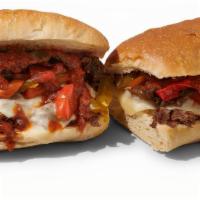 The Scarlet · Shaved ribeye, marinara sauce, roasted sweet peppers, grilled onions, mozzarella cheese