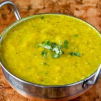 Daal Fry · Yellow lentils sautéed with herbs and spices. Served with basmati rice.