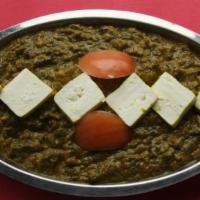 Saag Paneer · Homemade cheese and spinach simmered in a cream sauce. Served with basmati rice.