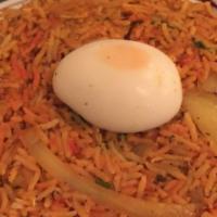 Chicken Biryani · A traditional dish of chicken marinated with spices and steam-cooked with naturally fragrant...