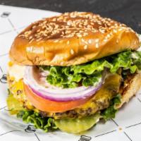 Angus Beef · 719 calories. 1/3 lb patty, house sauce, pickles, leaf lettuce, roma tomato, shaved onions a...