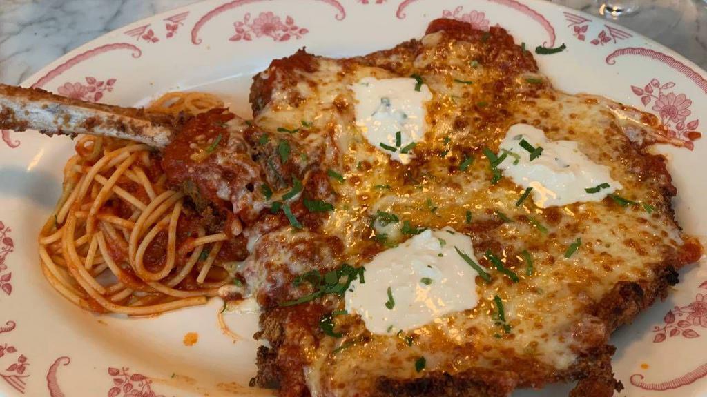 Chicken Parmigiana Catering · Breaded chicken and homemade pasta tossed in marinara sauce and covered with cheese. Supersized for your party.