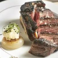 12 Oz Bone-In Strip (38 Day Dry Aged) · NY strip - moderately marbled with a deep robust flavor from the 38 days of dry-aging on the...