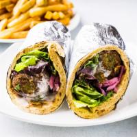 Falafel Hummus Wrap · Falafel, green mix, hummus, pickled onions, and white sauce.